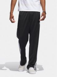 Adidas Spodnie dresowe adicolor Classics Firebird IJ7055 Czarny Regular Fit. Czarne spodnie sportowe męskie Adidas, m, bez wzorów, z dresówki. Za 209.99 zł.