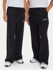 2005 Spodnie dresowe Unisex Cascade Czarny Relaxed Fit. Czarne spodnie sportowe męskie 2005, m, bez wzorów, z bawełny. Za 159.99 zł.