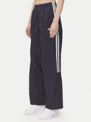 Adidas Spodnie dresowe adicolor Teamgeist JD0256 Czarny Oversize. Czarne spodnie dresowe damskie Adidas, bez wzorów, z dresówki. Za 209.99 zł.