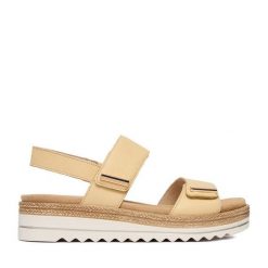 Sandały Remonte. Żółte sandały damskie Remonte, bez wzorów, bez obcasa, na płaskiej podeszwie, bez zapięcia. Za 379.99 zł.