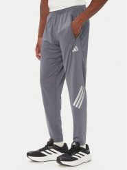 Adidas Spodnie dresowe Adi365 Iconic KS5806 Szary ciemny Regular Fit. Szare spodnie sportowe męskie Adidas, l, bez wzorów, z dresówki, do biegania. Za 279.99 zł.