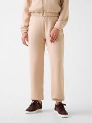 Guess Spodnie materiałowe 169841 Beżowy Slim Fit. Brązowe spodnie materiałowe damskie Guess, z aplikacjami, z materiału. Za 345.00 zł.