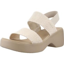 Sandały SKECHERS 119413S Beżowy. Brązowe sandały damskie Skechers, bez wzorów, z materiału, bez obcasa, bez zapięcia. Za 206.99 zł.