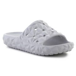 Klapki Crocs Classic Geometric Slide V2 W 209608-1FT szare. Szare klapki damskie bez wzorów, sportowe, bez obcasa, bez zapięcia. Za 271.50 zł.