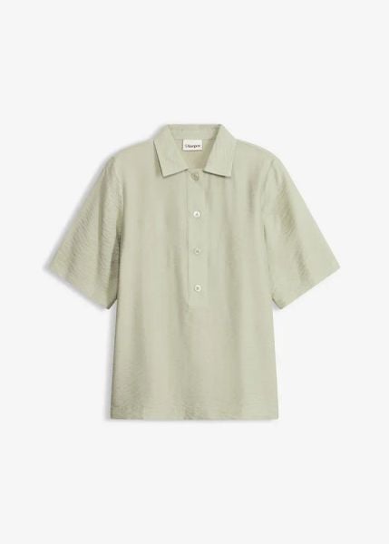 Bluzka w stylu tuniki, lekko prześwitująca. Białe bluzki damskie bonprix, bez wzorów, bez kołnierzyka, bez ramiączek. Za 37.99 zł.