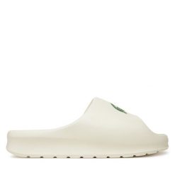 Klapki Lacoste. Białe klapki damskie Lacoste, bez wzorów, bez obcasa, bez zapięcia. Za 269.99 zł.
