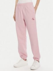 Calvin Klein Jeans Spodnie dresowe Moologo LV047B235G Różowy Regular Fit. Czerwone spodnie dresowe damskie Calvin Klein Jeans, bez wzorów, z bawełny. Za 239.99 zł.
