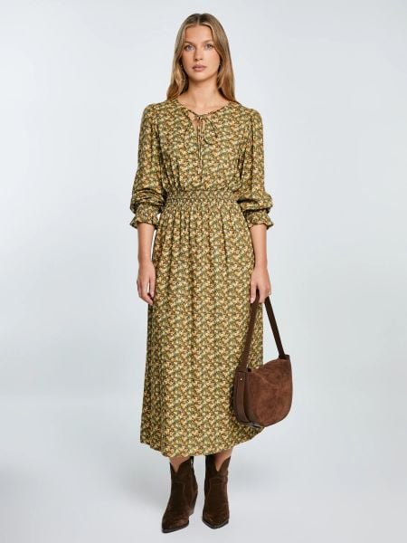 Sukienka damska midi z wiskozy z motywem kwiatowym żółta Londa 201. Żółte sukienki damskie BIG STAR, l, bez wzorów, z wiskozy, bez kołnierzyka, bez ramiączek, maxi. W wyprzedaży za 199.99 zł.