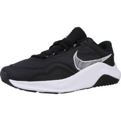 Tenisówki Nike Model Legend Essential 3 Wome Kolor Czarny. Czarne trampki i tenisówki damskie Nike, bez wzorów, z gumy, bez zapięcia. Za 519.00 zł.