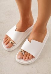 Białe Klapki Japonki Ozdobione Aplikacją na Palcu Noevianna. Białe klapki damskie Renee, na lato, z aplikacjami, z jeansu, bez obcasa, na płaskiej podeszwie, bez zapięcia. Za 79.99 zł.