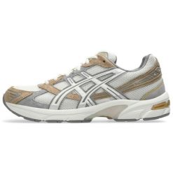 Trampki Asics Sr. Szare trampki i tenisówki damskie Asics, bez wzorów, z materiału, bez zapięcia. Za 710.99 zł.