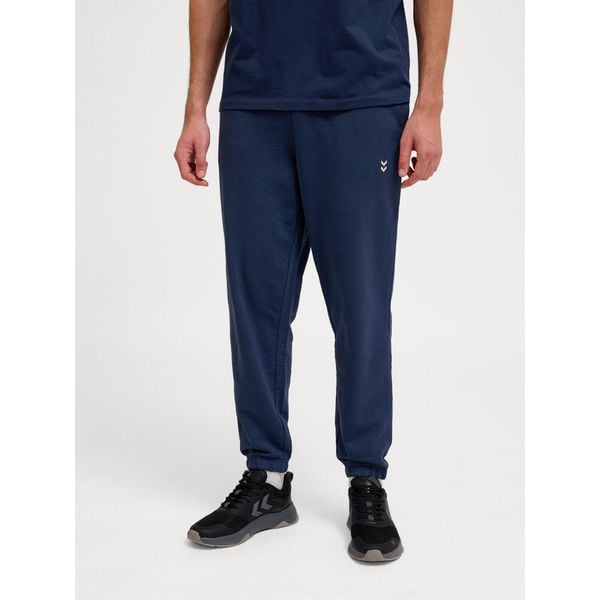 Spodnie do biegania Hummel Pulse. Niebieskie spodnie sportowe męskie Hummel, bez wzorów, z dresówki, do biegania. Za 177.00 zł.