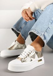 Złote Trampki na Grubej Podeszwie z Cyrkoniową Naszywką Penirea. Żółte trampki i tenisówki damskie Renee, z aplikacjami, bez zapięcia. Za 69.99 zł.