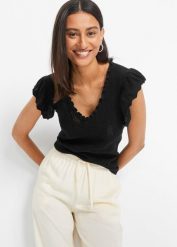 Koszulka z miękkiej, lejącej mieszanki wiskozy. Czarne bluzki damskie bonprix, bez wzorów, z dzianiny, bez kołnierzyka, bez ramiączek. Za 84.99 zł.