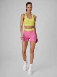 4F Legginsy krótkie treningowe damskie - koralowe S. Pomarańczowe legginsy damskie 4F, bez wzorów, z materiału. Za 99.99 zł.