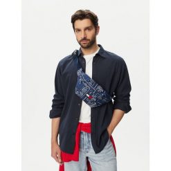 Nerka Tommy Jeans. Niebieskie saszetki i nerki męskie Tommy Jeans, bez wzorów, z jeansu. Za 209.99 zł.