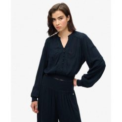 Bluzka z długim rękawem z marszczoną koronką. Niebieskie bielizna sportowa damska Superdry, l, bez wzorów, z koronki. Za 284.00 zł.