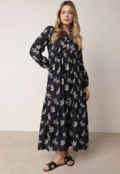 Niebieska Rozkloszowana Sukienka z Wiskozy z Dekoltem na Guziki Watesa. Niebieskie sukienki damskie Born2be, na co dzień, l, bez wzorów, z materiału, boho, bez kołnierzyka, bez ramiączek, maxi, proste. Za 129.99 zł.