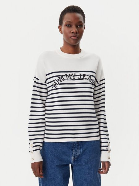 Tommy Jeans Sweter Varsity DW0DW20251 Écru Regular Fit. Swetry nierozpinane damskie Tommy Jeans, xl, bez wzorów, z bawełny, bez kołnierzyka, bez ramiączek. Za 279.99 zł.