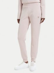 Guess Spodnie dresowe V4YB08 KCAY2 Różowy jasny Regular Fit. Czerwone spodnie dresowe damskie Guess, z aplikacjami, z dresówki. Za 344.99 zł.