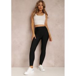 Czarne Legginsy Hyraste. Czarne legginsy damskie Renee, z aplikacjami, z dzianiny. Za 49.99 zł.
