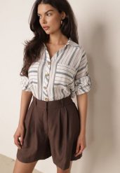 Jasnoniebieska Letnia Koszula Oversize z Bawełny w Paski z Nietoperzowymi Rękawami Sheilla. Niebieskie koszule damskie Born2be, bez wzorów, z bawełny, eleganckie, bez kołnierzyka, bez ramiączek. Za 99.99 zł.