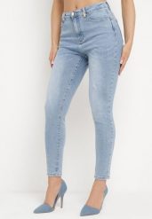 Jasnoniebieskie Jeansy Skinny z Elastycznej Bawełny z Ozdobną Szlufką Almiria. Niebieskie jeansy damskie Born2be, bez wzorów, z bawełny, eleganckie, z podwyższonym stanem. Za 89.99 zł.