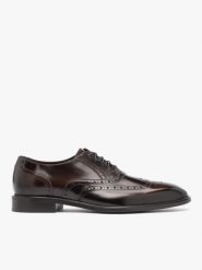 Ciemnobrązowe eleganckie półbuty. Brązowe półbuty męskie Ryłko, bez wzorów, z lakierowanej skóry, bez obcasa, bez zapięcia. Za 499.99 zł.