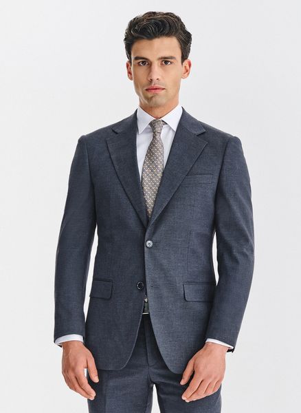 PAKO LORENTE - Granatowa marynarka garniturowa. Garnitury męskie Pako Lorente, m, bez wzorów, z elastanu, biznesowe, bez kołnierzyka, bez ramiączek. Za 699.99 zł.