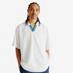 Koszulka polo oversize męska Heritage. Białe koszulki sportowe męskie Decathlon, m, bez wzorów, z materiału, bez ramiączek, na golfa. Za 89.99 zł.