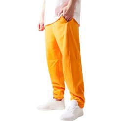 Spodnie Urban Classics basic. Brązowe spodnie materiałowe męskie Urban Classics, bez wzorów. Za 198.50 zł.