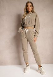 Ciemnobeżowy Komplet Dresowy z Dodatkiem Bawełny Spodnie z Gumką w Pasie i Bluza z Kapturem Hasaria. Brązowe bluzy damskie Renee, l, bez wzorów, z bawełny, bez ramiączek, z kapturem. Za 119.99 zł.