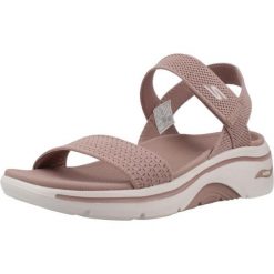 Sandały SKECHERS GO WALK ARCH FIT 2.0 Rose. Fioletowe sandały damskie Skechers, bez wzorów, z materiału, bez obcasa, bez zapięcia. Za 233.99 zł.