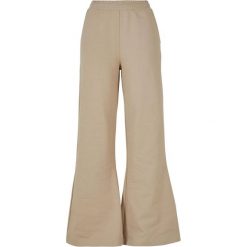 Damskie Spodnie Dresowe Z Szeroką Nogawką Z Bawełny Organicznej. Brązowe spodnie dresowe damskie Urban Classics, bez wzorów, z bawełny, sportowe, długie. Za 220.99 zł.
