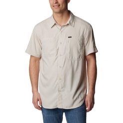 Koszula z krótkim rękawem męska Columbia Silver Ridge Utility Short Sleeve. Brązowe koszule męskie Columbia, m, bez wzorów, sportowe, bez kołnierzyka, bez ramiączek. Za 239.99 zł.