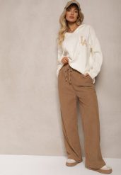 Ciemnobeżowe Spodnie o Szerokim Kroju High Waist z Wiązaniem w Pasie Ettianne. Brązowe spodnie materiałowe damskie Renee, bez wzorów, z jeansu, eleganckie, z podwyższonym stanem. Za 39.99 zł.
