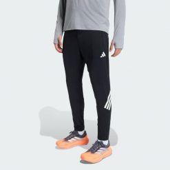 Spodnie adi365 Iconic Running. Czarne spodnie sportowe męskie Adidas, bez wzorów, do biegania, climacool (adidas). Za 279.00 zł.