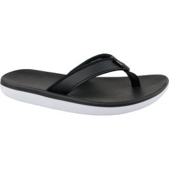 Czarne Klapki Nike Bella Kai Thong AO3622-002. Czarne klapki damskie Nike, bez wzorów, z materiału, bez obcasa, bez zapięcia. W wyprzedaży za 229.00 zł.