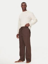 Tommy Hilfiger Spodnie materiałowe UM0UM03689 Brązowy Relaxed Fit. Brązowe spodnie materiałowe męskie Tommy Hilfiger, bez wzorów, z bawełny. Za 379.99 zł.