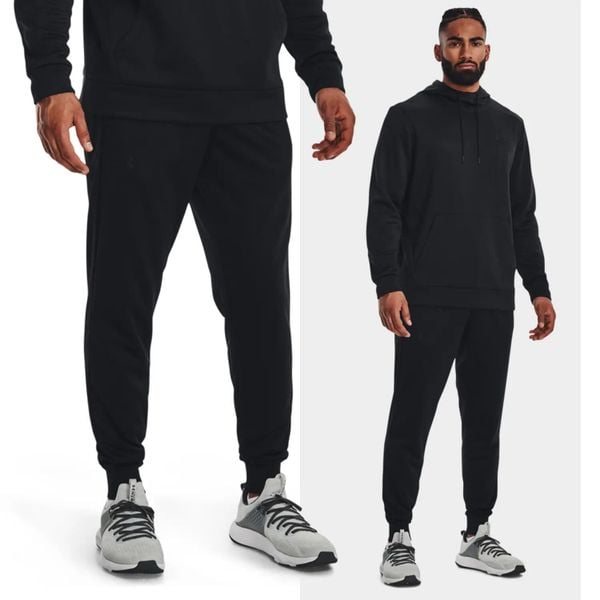 Spodnie dresowe męskie UNDER ARMOUR 1373362. Czarne spodnie sportowe męskie Under Armour, m, bez wzorów, z dresówki, na fitness i siłownię. Za 249.99 zł.