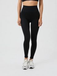 Bjorn_borg STUDIO SEAMLESS RIBBED TIGHTS — bezszwowe, prążkowane legginsy –. Czarne legginsy damskie Björn Borg, bez wzorów, z poliamidu. Za 319.50 zł.