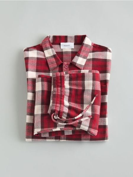 Dwuczęściowa piżama w kratę - czerwony. Czerwone piżamy męskie Reserved, l, bez wzorów, z bawełny, bez kołnierzyka, bez ramiączek. Za 159.99 zł.