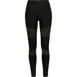 Damskie legginsy urban classic z wstawkami z koronki. Czarne legginsy damskie Urban Classics, bez wzorów, z koronki. Za 160.50 zł.