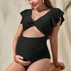 Strój kąpielowy ciążowy z falbanką na plażę i basen Britani. Czarne stroje kąpielowe damskie Intica, l, bez wzorów. Za 149.00 zł.