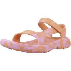 Klapki Teva Model W Hurricane Kolor Pomarańczowy. Brązowe klapki damskie Teva, bez wzorów, z gumy, sportowe, bez obcasa, bez zapięcia. Za 231.50 zł.