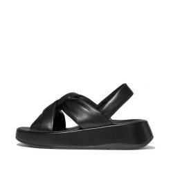 Sandały damskie FitFlop F-Mode Knot Soft-Leather Flatform B/Strap. Czarne sandały damskie Flip Flop, bez wzorów, ze skóry, bez obcasa, na płaskiej podeszwie, bez zapięcia. Za 729.50 zł.