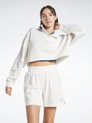 Reebok Bluza Reebok Classics Varsity Sweatshirt HT7843 Biały. Białe bluzy damskie Reebok, l, bez wzorów, z bawełny, bez ramiączek, bez kaptura. Za 149.99 zł.
