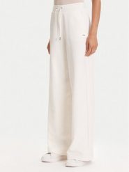 Guess Spodnie dresowe V5YB19 KBSL2 Écru Regular Fit. Spodnie dresowe damskie Guess, z aplikacjami, z dresówki. Za 259.99 zł.