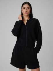 4F Bluza dresowa regular z modalem damska - czarna S. Czarne bluzy damskie 4F, s, bez wzorów, z dresówki, bez ramiączek, z kapturem. Za 199.99 zł.