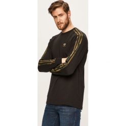 Adidas Originals - Bluza. Czarne bluzy męskie adidas Originals, l, z aplikacjami, z bawełny, bez ramiączek, bez kaptura. Za 149.90 zł.